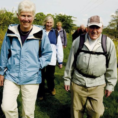 Older adults walking in a group