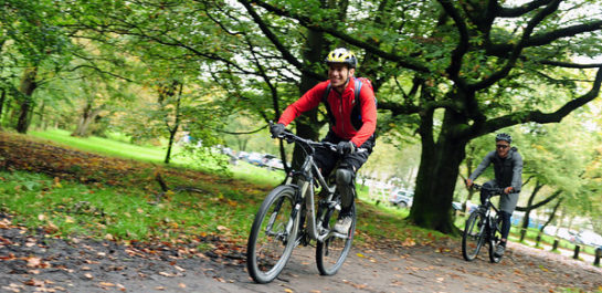 Cycling group in woods