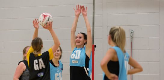 Group of women playing netball