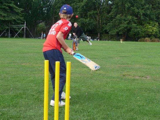 Child playing cricket