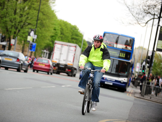 Man cycling on road