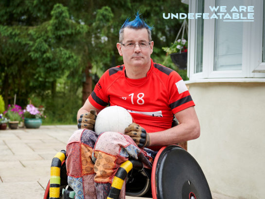 man in wheelchair ready to play wheelchair rugby