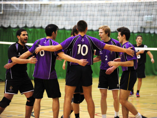 Volleyball team huddle