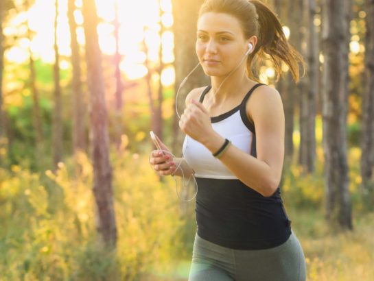 Woman running with watch on