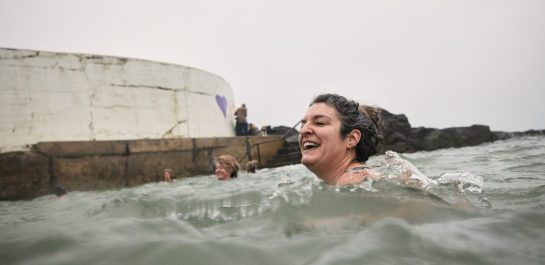 Woman swimming in open water