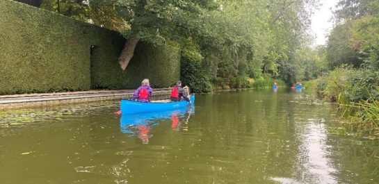 Two people canoeing on the canal