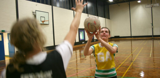 Woman playing netball