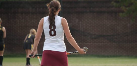 Girl playing hockey