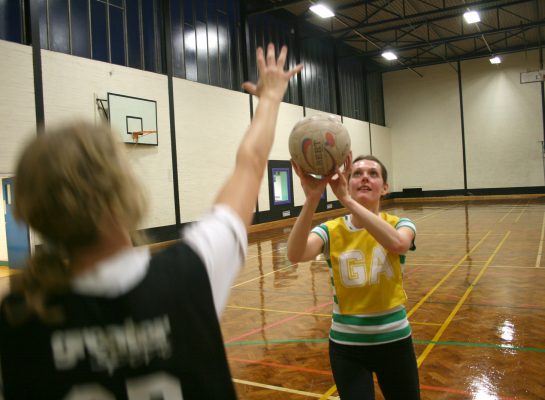 Woman playing netball