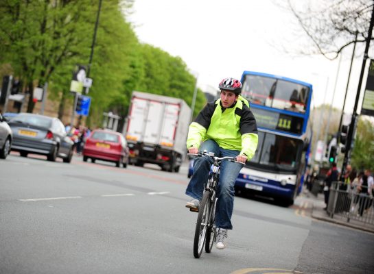 Man cycling on road